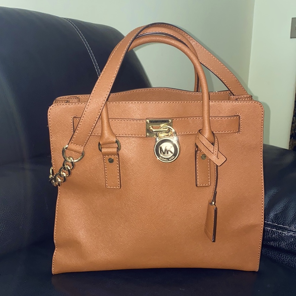 Authentic, brand new!!! Never worn!!! authentic Michael Kors purse.